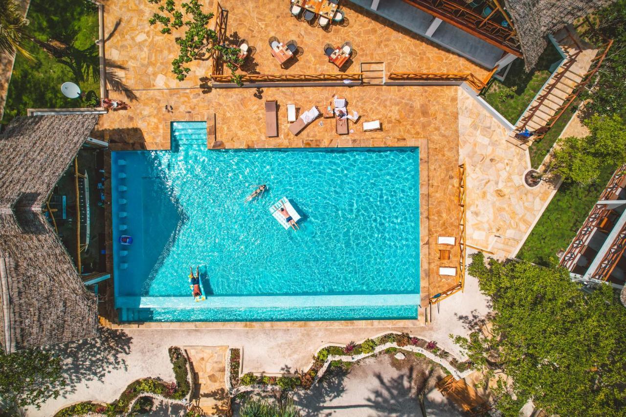 Zanzibella Hotel & Spa Ківенґва Екстер'єр фото Aerial view of the swimming pool at the Hotel
